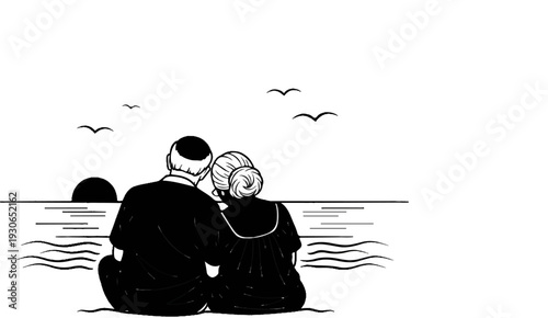 Couple watching sunset over ocean with birds flying overhead