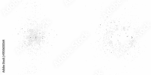 Abstract white texture with scattered dark specks and grainy imperfections