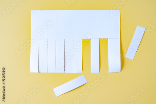 Tear-off papers notice, advertisement with cut slips .