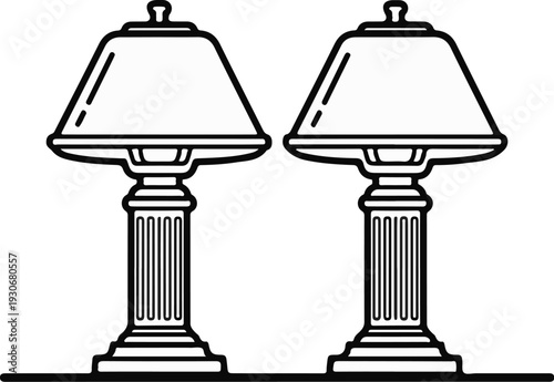 Two elegant, classically styled desk lamps with fluted pedestals