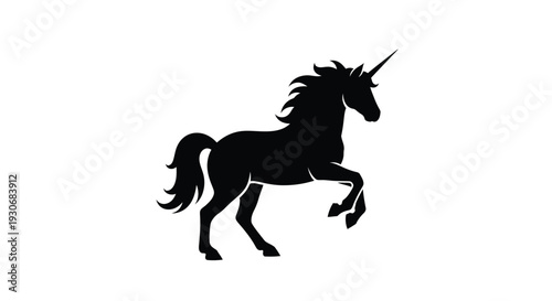 Majestic unicorn rearing up depicted in a striking black silhouette