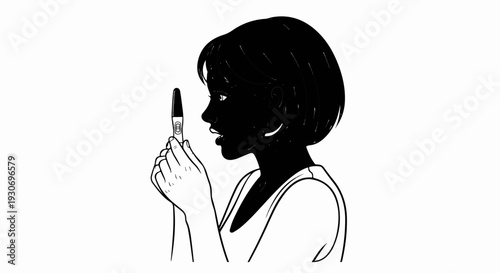Woman with short hair looking at pregnancy test result in hands