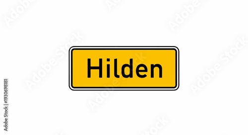 Yellow rectangular sign with black border and text "Hilden" on white background
