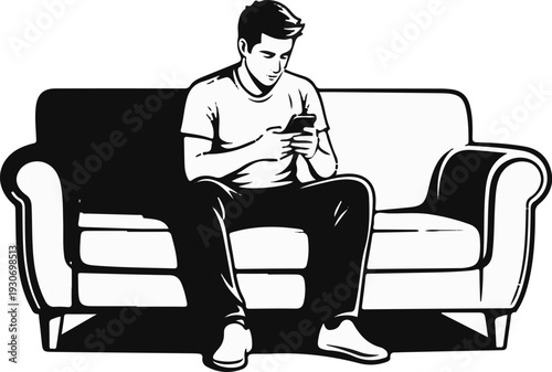 Young man sitting on sofa, absorbed in his smartphone screen