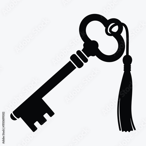 Vintage key with elegant tassel on white background
