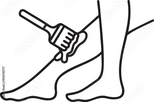 Person applying lotion or oil to their foot with a brush