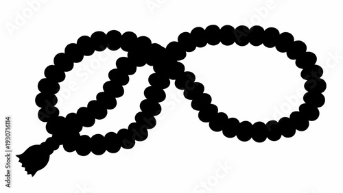 Black prayer beads in a loop with tassel