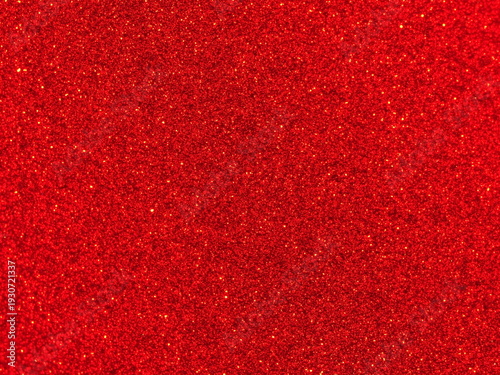 Macro photography of vibrant ruby red metallic paint texture with fine sparkles
