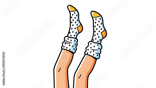 Pair of legs pointing upwards wearing white socks with black polka dots and orange accents on a white backdrop.