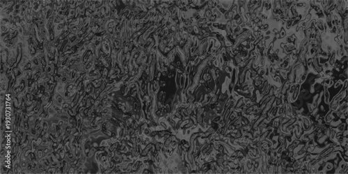 Dark textured abstract background with organic fluid shapes and subtle light reflections creating a moody and complex surface pattern