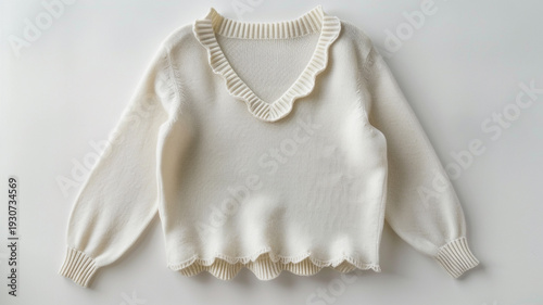 Wallpaper Mural Elegant white v-neck sweater with scalloped edges and puff sleeves, a chic lifestyle fashion piece for cozy autumn style. Torontodigital.ca