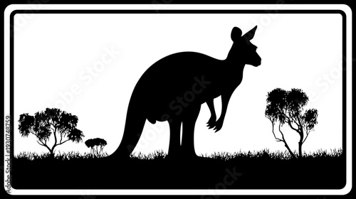 Silhouetted kangaroo stands on grassy ground with small trees, framed in a white and black border