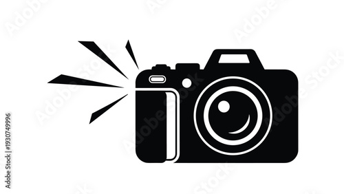 Black silhouette of a digital camera with a bright flash effect used as a symbol for photography media and capturing special moments.