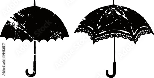 Two vintage lace umbrellas with curved handles in black silhouette