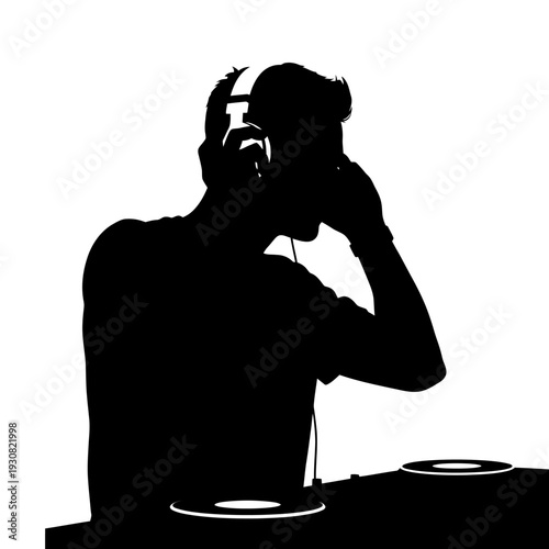 Silhouette of a DJ in a club spinning records and mixing tracks.