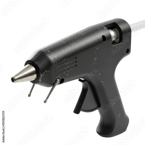Black hot glue gun isolated on white background
