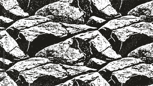 Monochrome textured pattern of cracked rocks arranged in a geometric layout