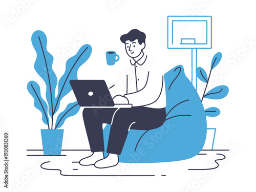 Man sitting on bean bag chair with laptop and coffee cup at home office