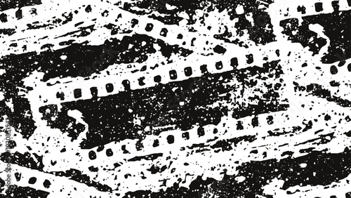 Old vintage film strips scattered randomly grayscale nostalgic film reel background