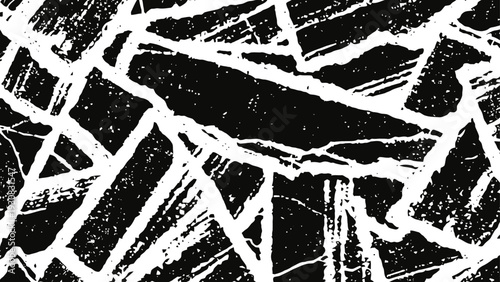 Abstract black and white cracked texture background distressed grunge pattern with irregular fragmented shapes