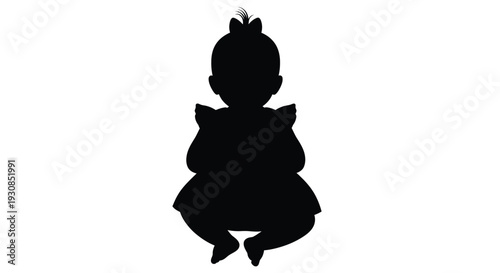 A dark silhouette of a seated baby with a bow silhouette
