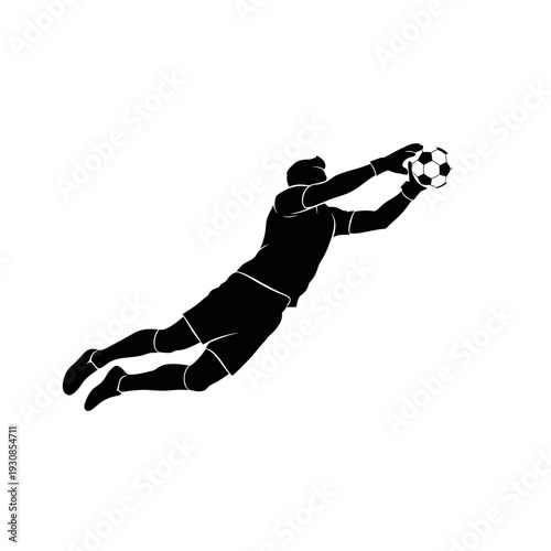 Diving goalkeeper reaches for the ball during a dramatic soccer save in a high-stakes match.