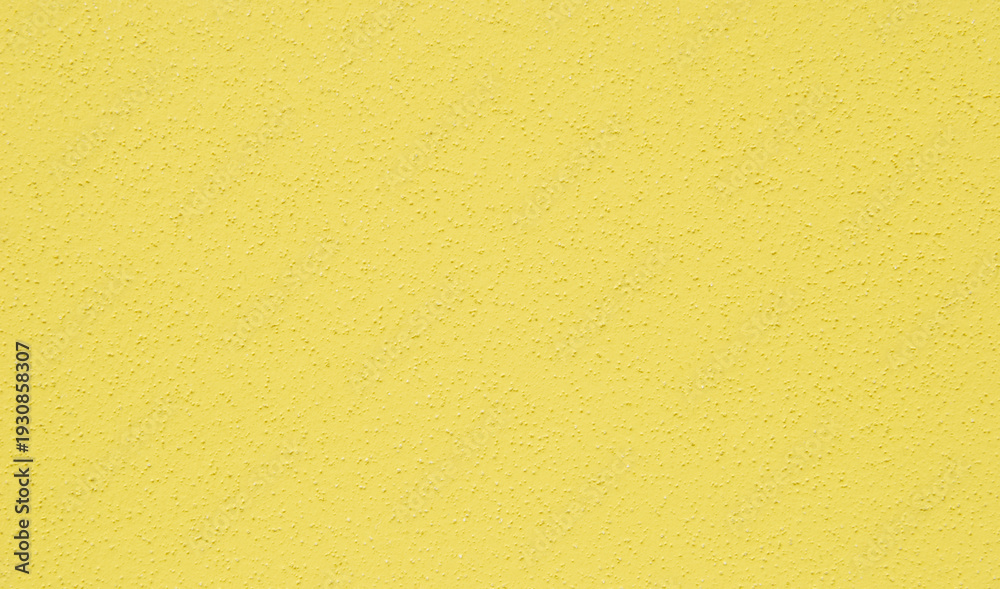 Obraz premium Yellow plastered dry wall texture