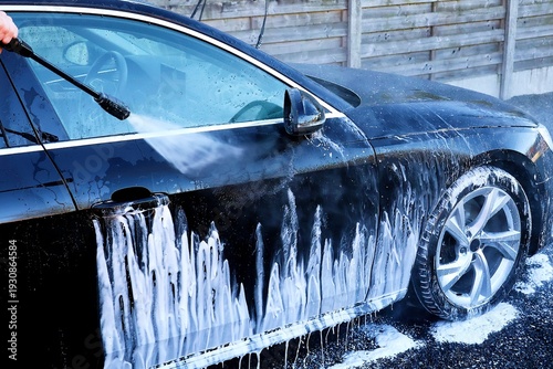 Car is cleaned with foam and high pressure cleaner.