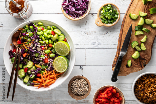 A freshly made sunflower crunch edamame salad with ingredients all around.