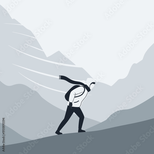 Person Battling Intense Wind While Ascending Snowy Mountain Peaks