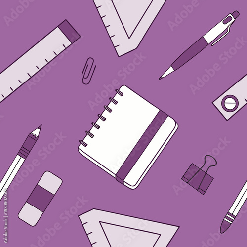 Stationery items arranged on purple background with notebook and rulers