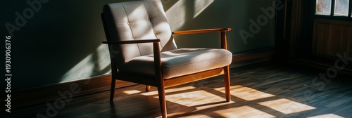 Living room scene featuring sunlight shining on a wooden chair and the floor. The image conveys warmth and relaxation.