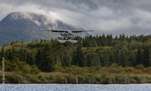 Obraz na plátně A float plane landing in the mountains