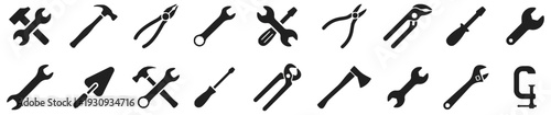 Set of black silhouette icons representing various hand tools and construction equipment
