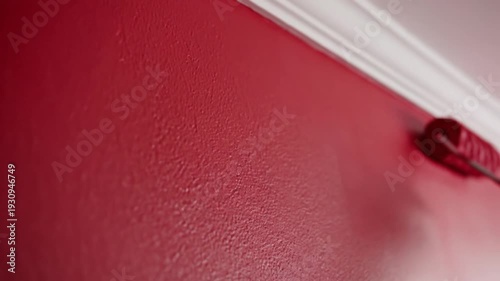Wallpaper Mural Paint roller applying textured red paint to a wall surface Torontodigital.ca