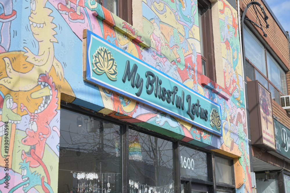 Naklejka premium sign on the outside of My Blissful Lotus, a metaphysical supply store, located at 1600 Gerrard St E, Toronto