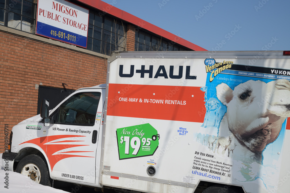 Fototapeta premium U-Haul rental truck parked outside Migson Public Storage at 2356 Gerrard St E, Toronto