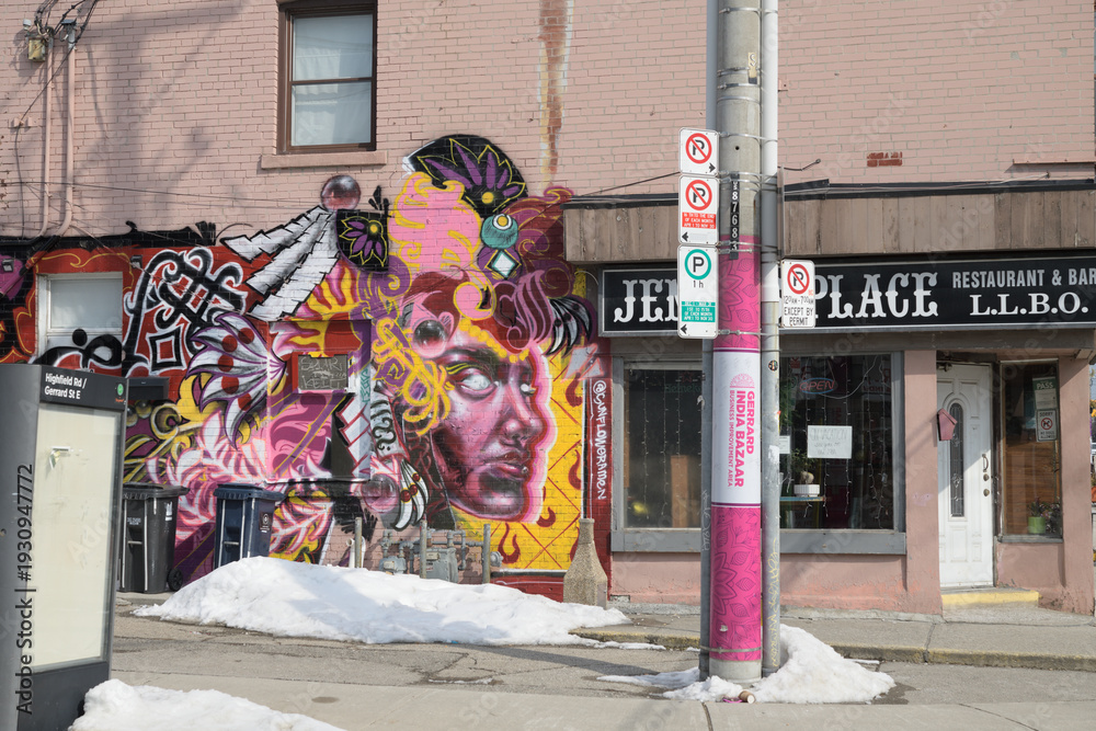 Naklejka premium exterior of Jenny's Place, a bar, located at 1338 Gerrard St E (Gerrard India Bazaar neighborhood) at Highfield Rd, Toronto 