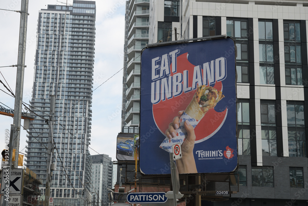 Obraz premium Tahini's restaurant road side billboard advertising sign, Toronto
