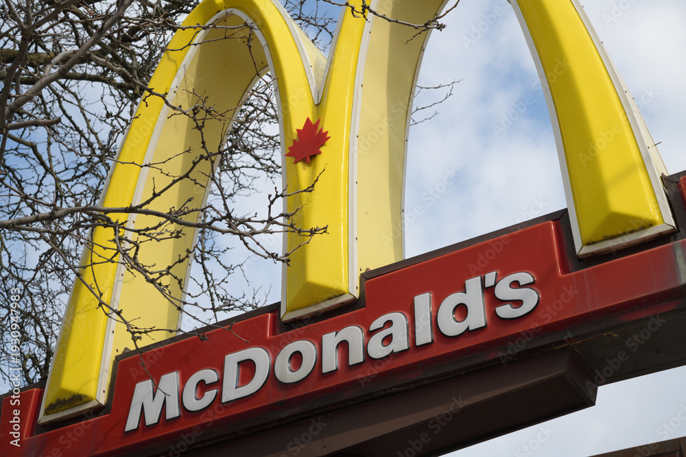 Obraz premium McDonald's Canada Golden Arches pylon sign at 1000 Gerrard St E, Toronto