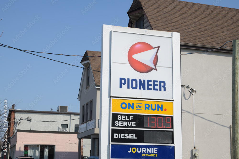 Fototapeta premium road side pylon sign at Pioneer gas station located at 2185 Gerrard St E, Toronto
