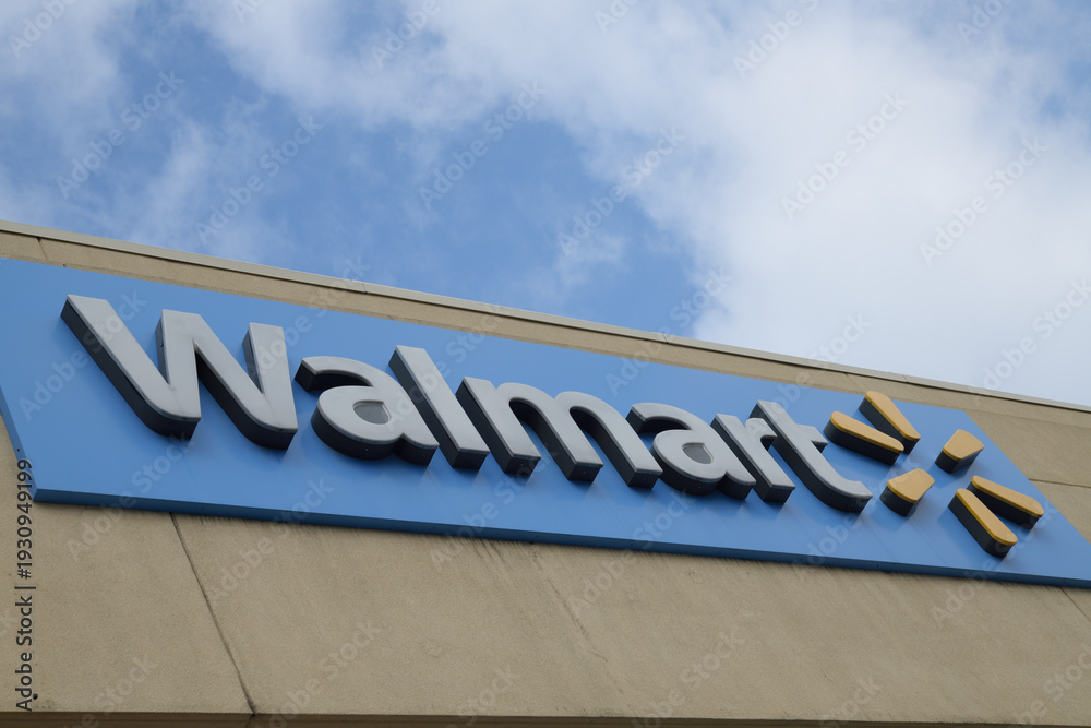 Fototapeta premium skyward view of a Walmart department store sign on the exterior of Gerrard Square Shopping Centre, 1000 Gerrard St E, Toronto