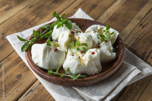 Vászonkép Creamy whole  burrata cheese in a bowl
