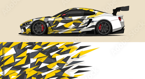 Camouflage racing car prototype with bold black yellow white pattern and streamlined design.