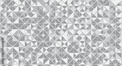 Abstract geometric background with a complex seamless mosaic pattern of triangles in various shades of grey and white.