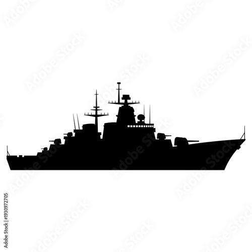 Silhouette of a large naval battleship cutting through calm waters at sea.