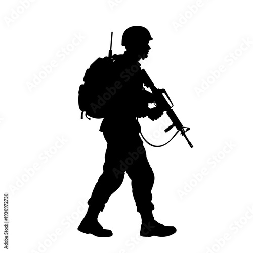 Silhouette of an armed soldier with backpack and rifle marching forward in a field.