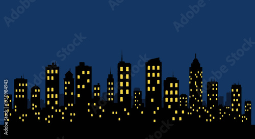 City Skyline at Night with Illuminated Buildings.