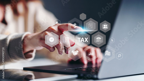 Photos Business woman pointing online tax service interface with digital finance icons,