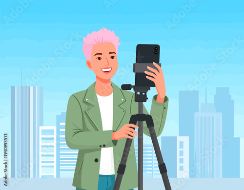 A male vlogger or content creator recording a video using a smartphone on a tripod. Concept of digital media and social influencer.